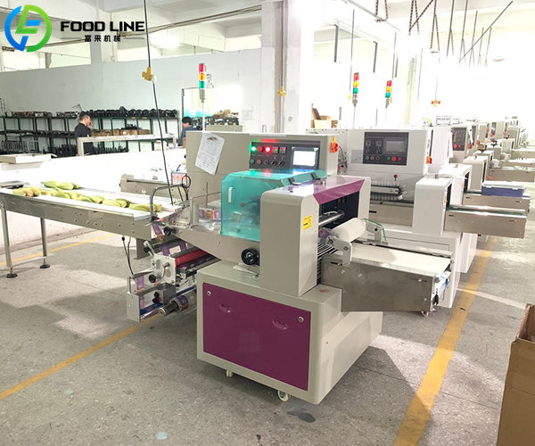 flow wrapper packaging machine