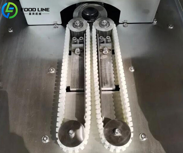 sausage tying mechanism