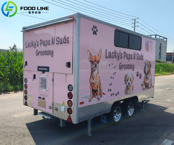 eye catching dog grooming trailer